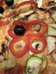 Gute Laune beim Pizzabacken!